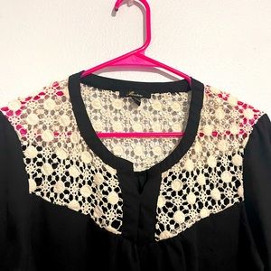 Black and white crochet detail blouse.